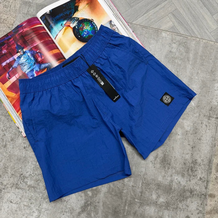 SI- SQUARE LOGO SWIM SHORTS ROYAL BLUE